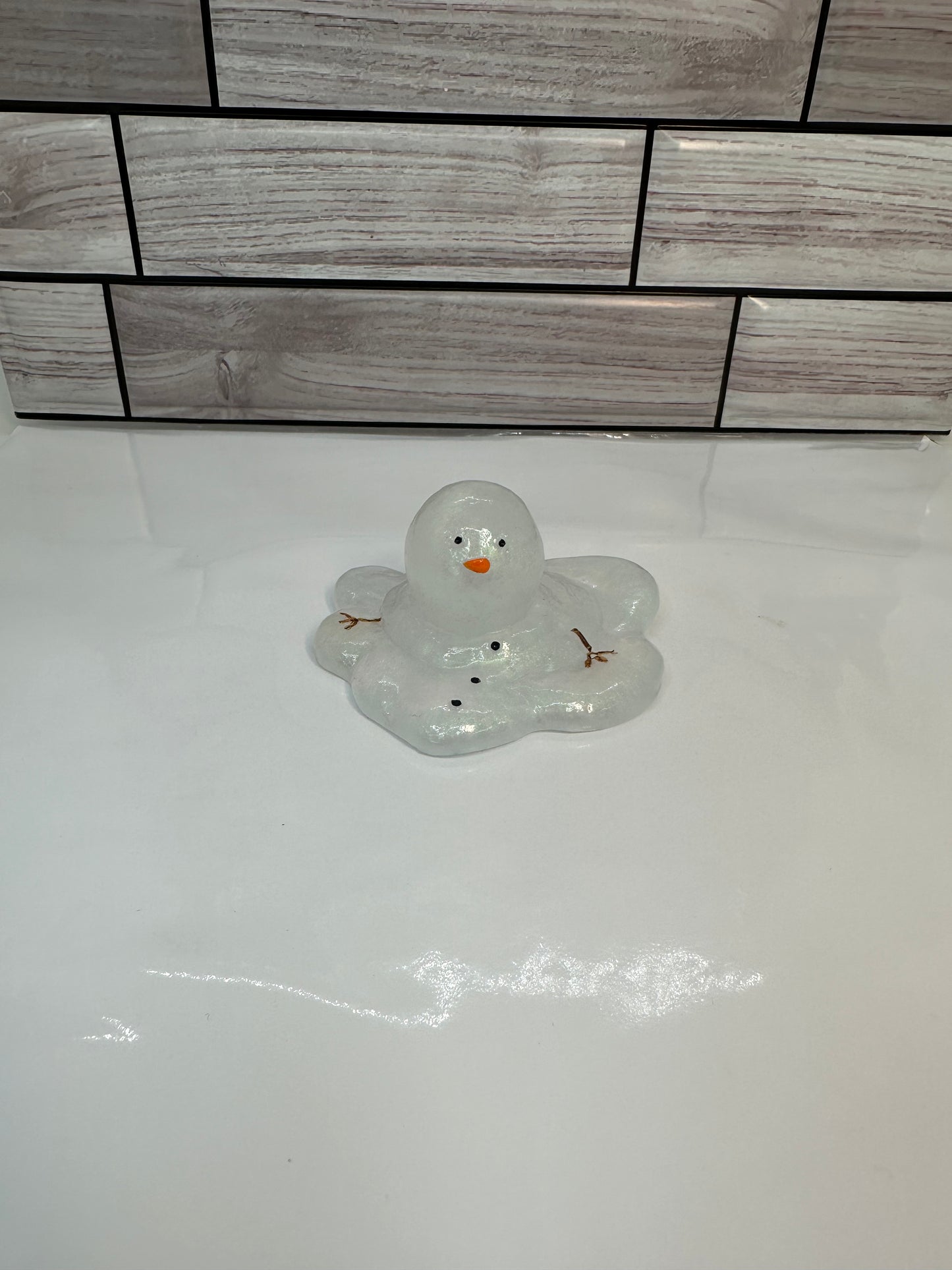 Melting Snowman Figurine