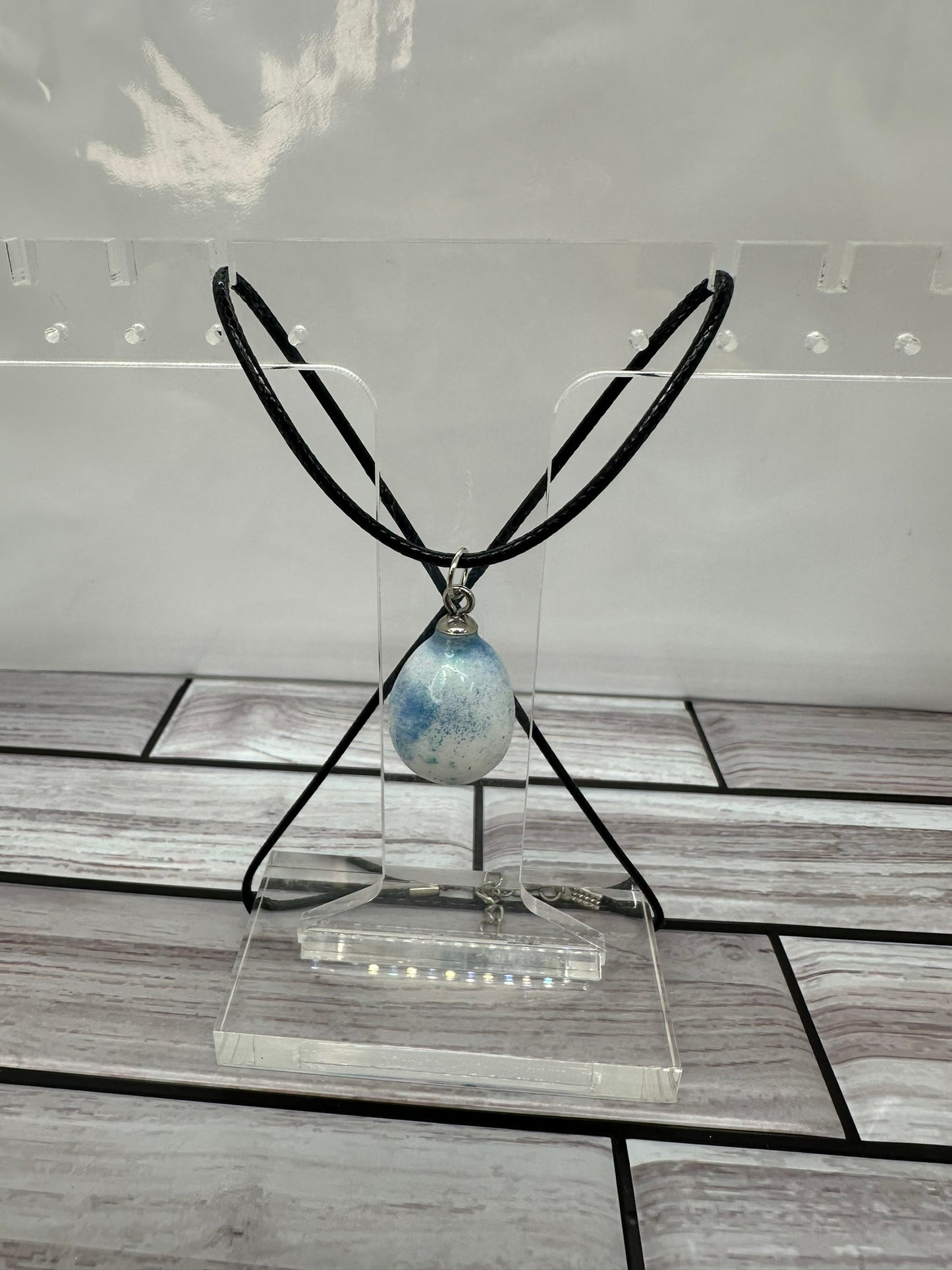 White Egg with Blue and Green Speckles Pendant Necklace