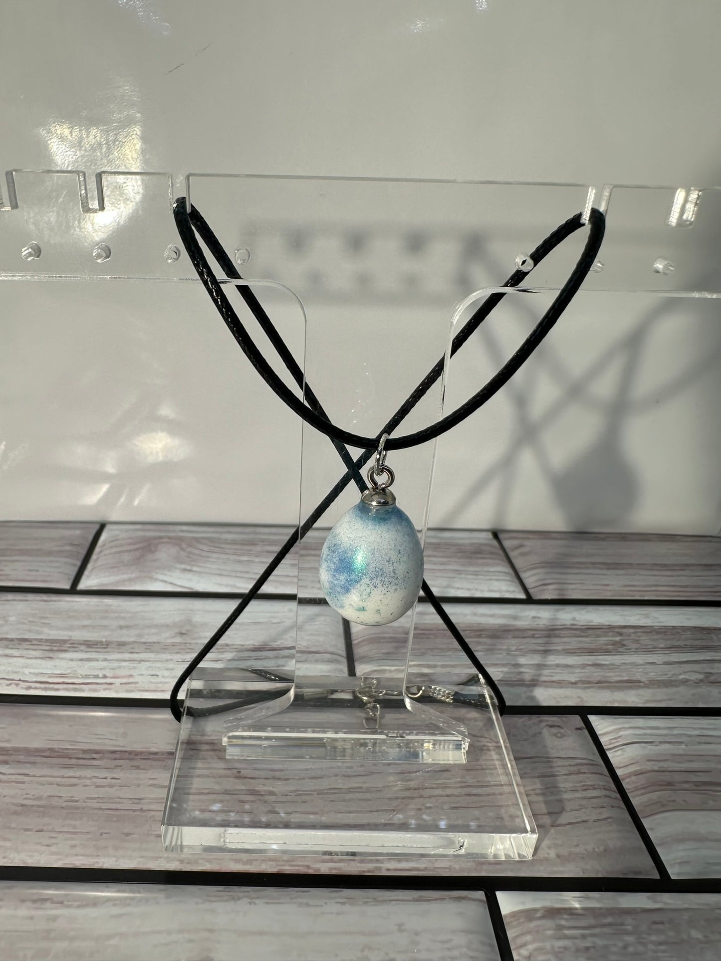 White Egg with Blue and Green Speckles Pendant Necklace