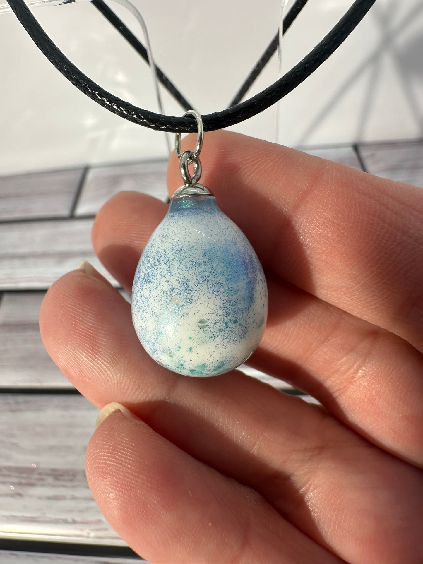 White Egg with Blue and Green Speckles Pendant Necklace