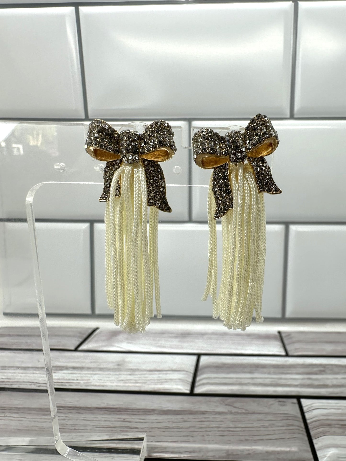 Gold Bow with Cream Tassel Earrings