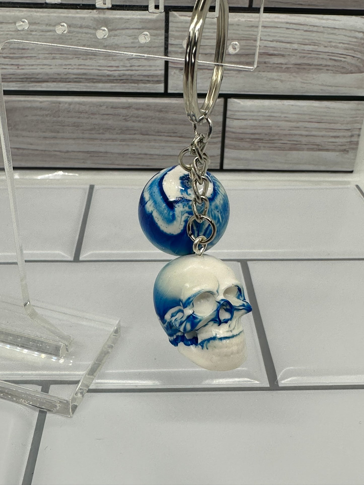 White & Blue Swirl Skull and Sphere Keychain