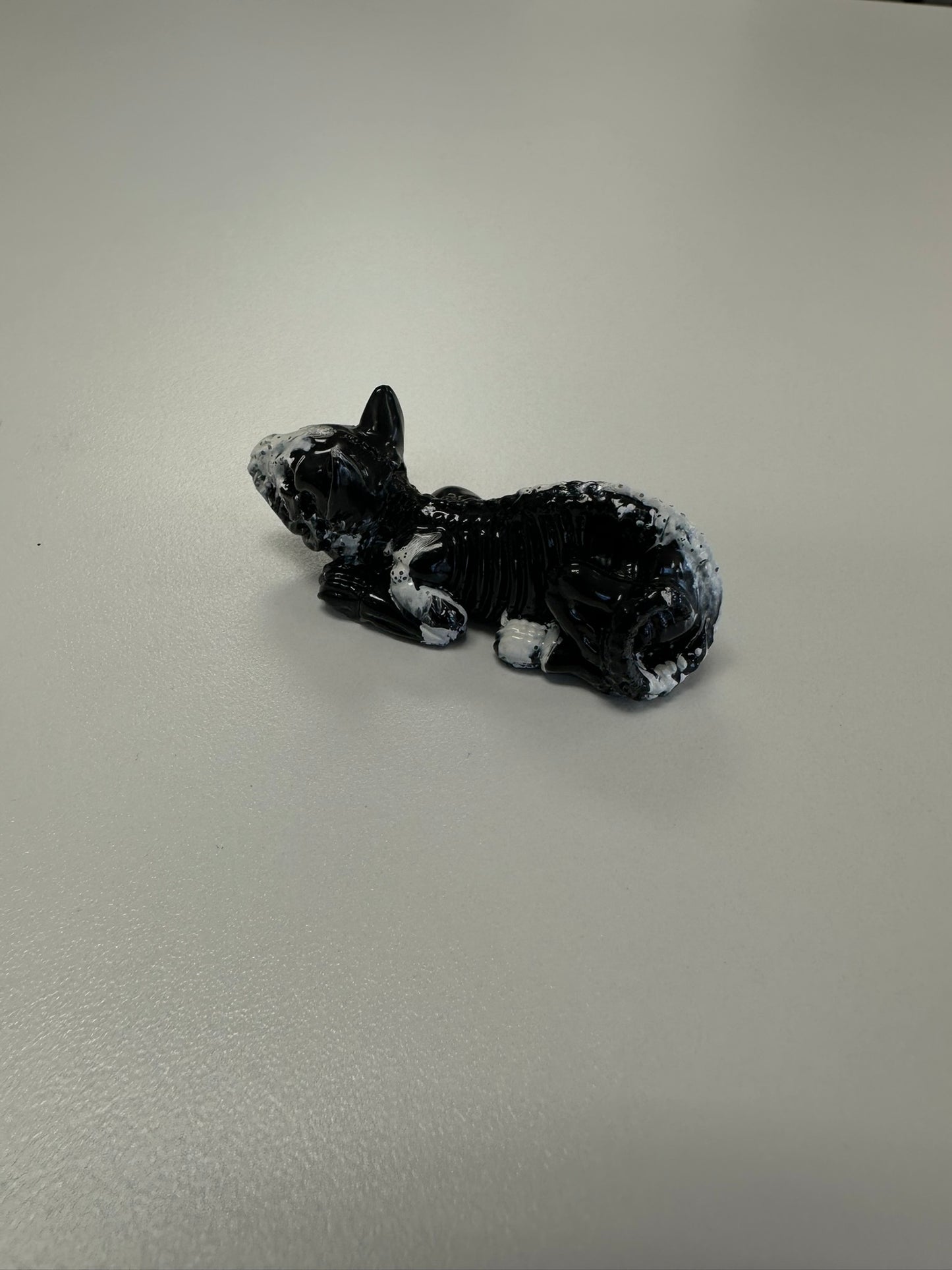 Marbled Madness: Black and White Skull Cat Figurine