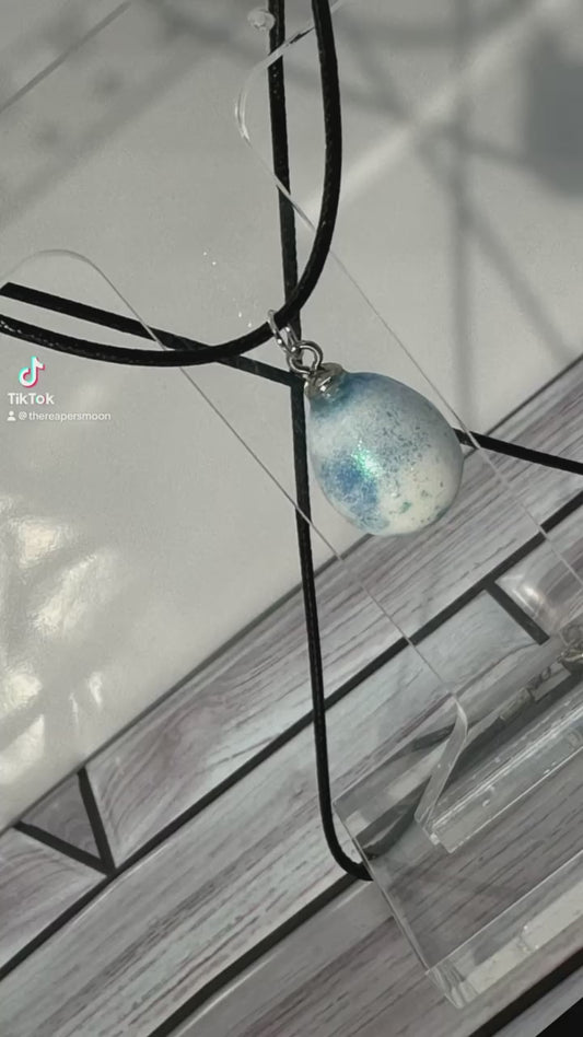 White Egg with Blue and Green Speckles Pendant Necklace