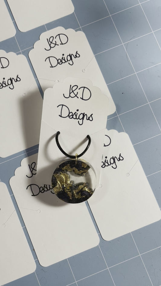 Land and Water Black and Gold Flake Round Resin Pendant Necklace