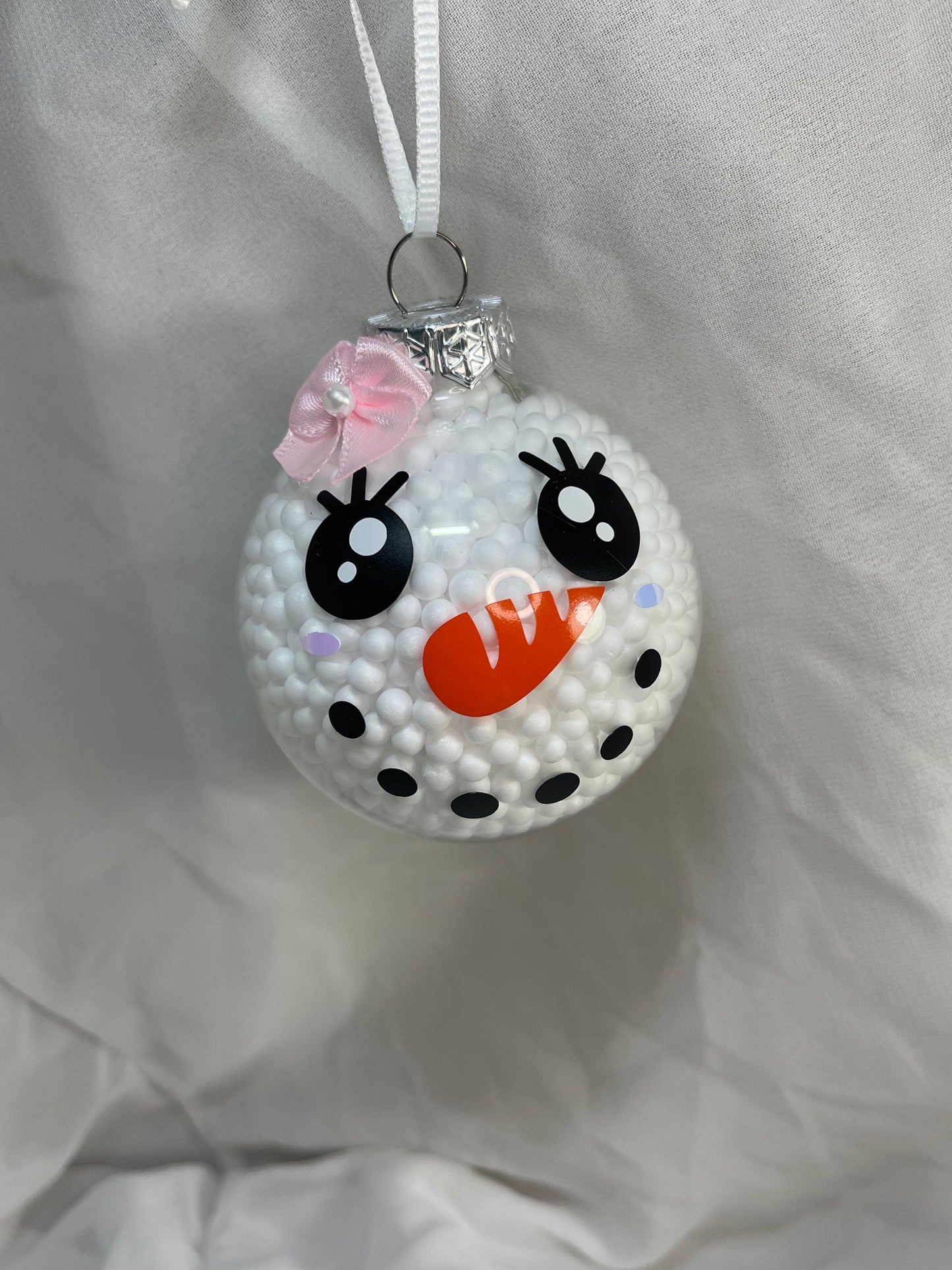 Big Eyed Snow Woman with Pink Bow Snowman Fake Snow Filled Christmas Glass Ornament