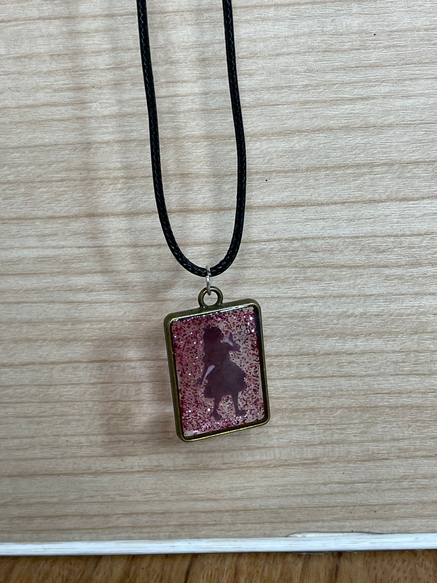 Lost Girl Pink Glitter Resin Pendant Necklace with Metal Frame