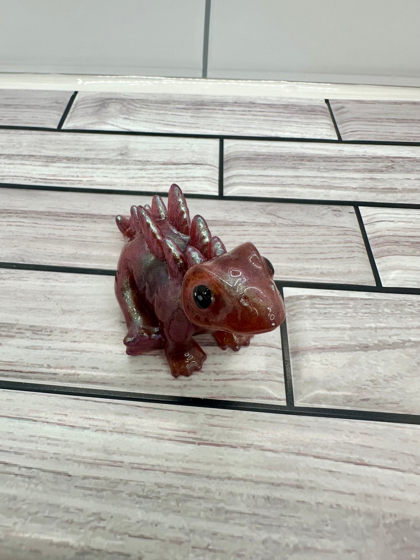 "Cherry Cola Shimmer" Stegosaurus Resin Figurine | Iridescent Dino Desk Buddy