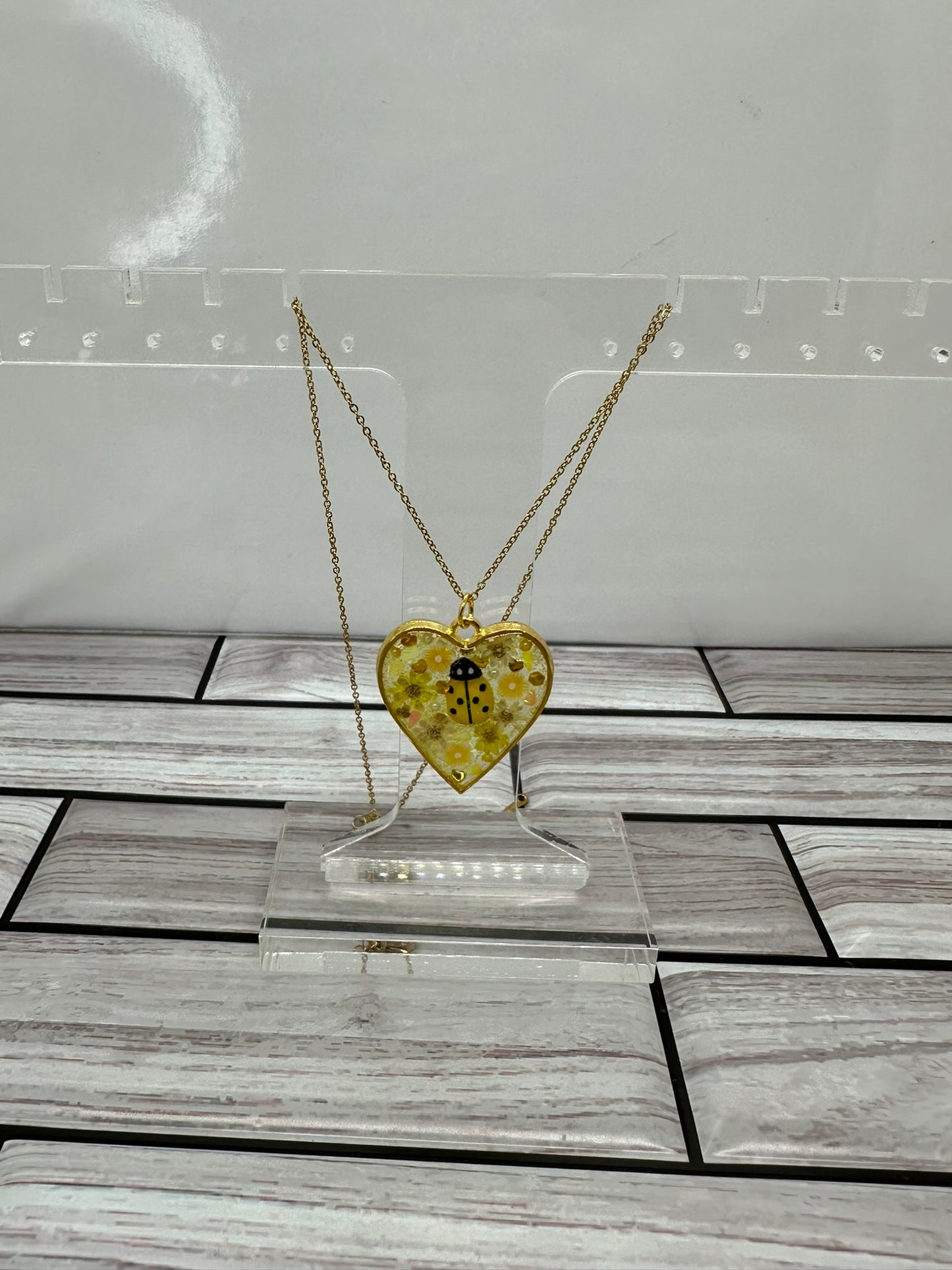 Yellow Ladybug and Flowers Heart Necklace