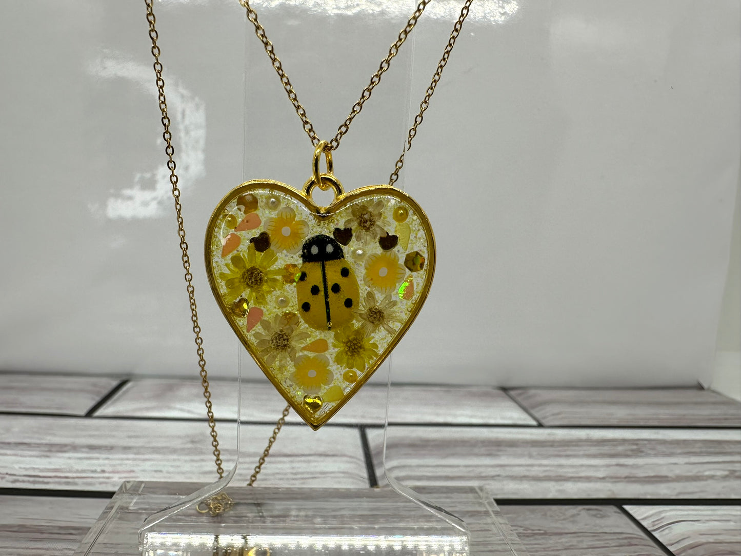 Yellow Ladybug and Flowers Heart Necklace