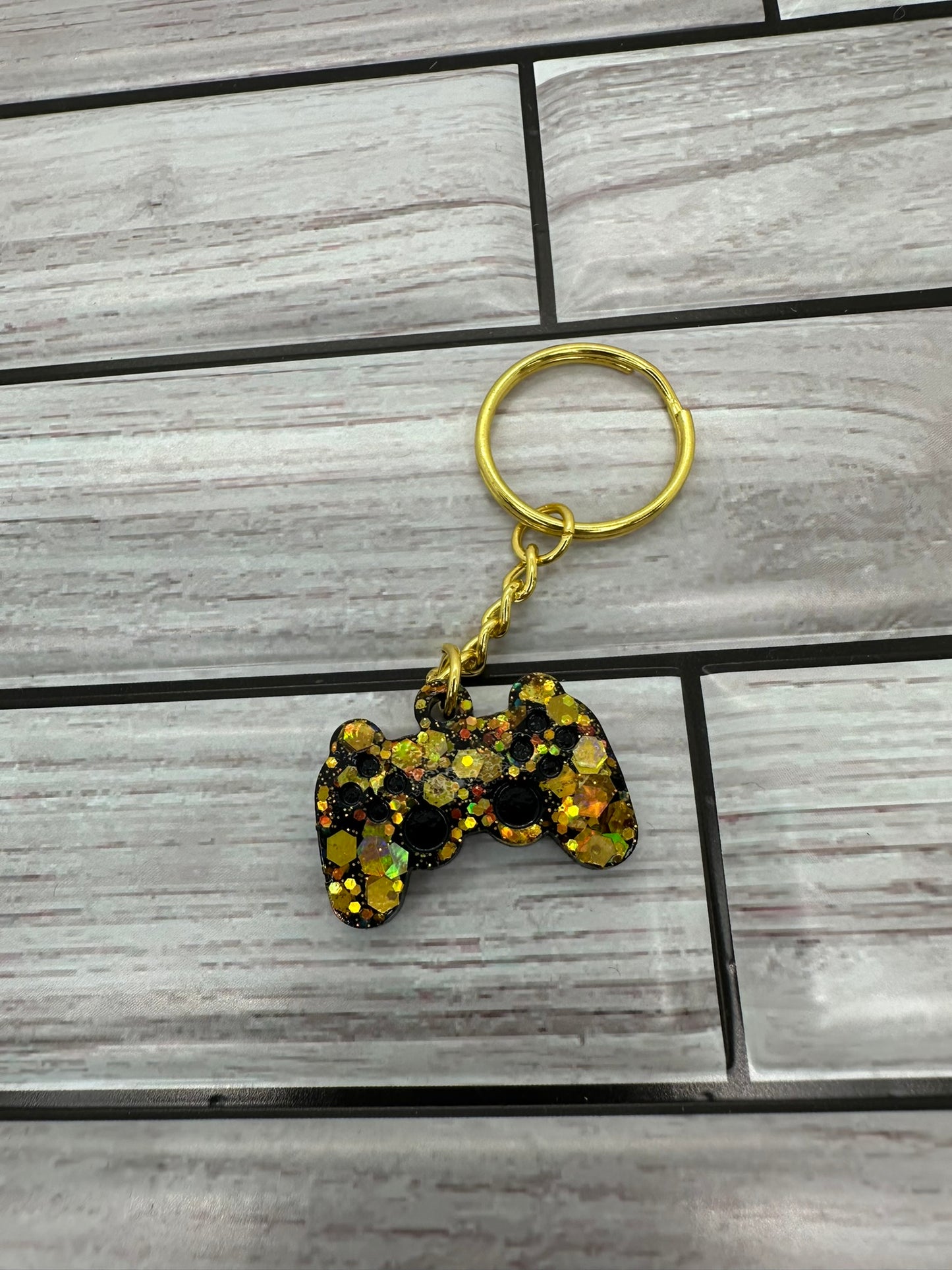 Gold and Black Game Controller Keychain