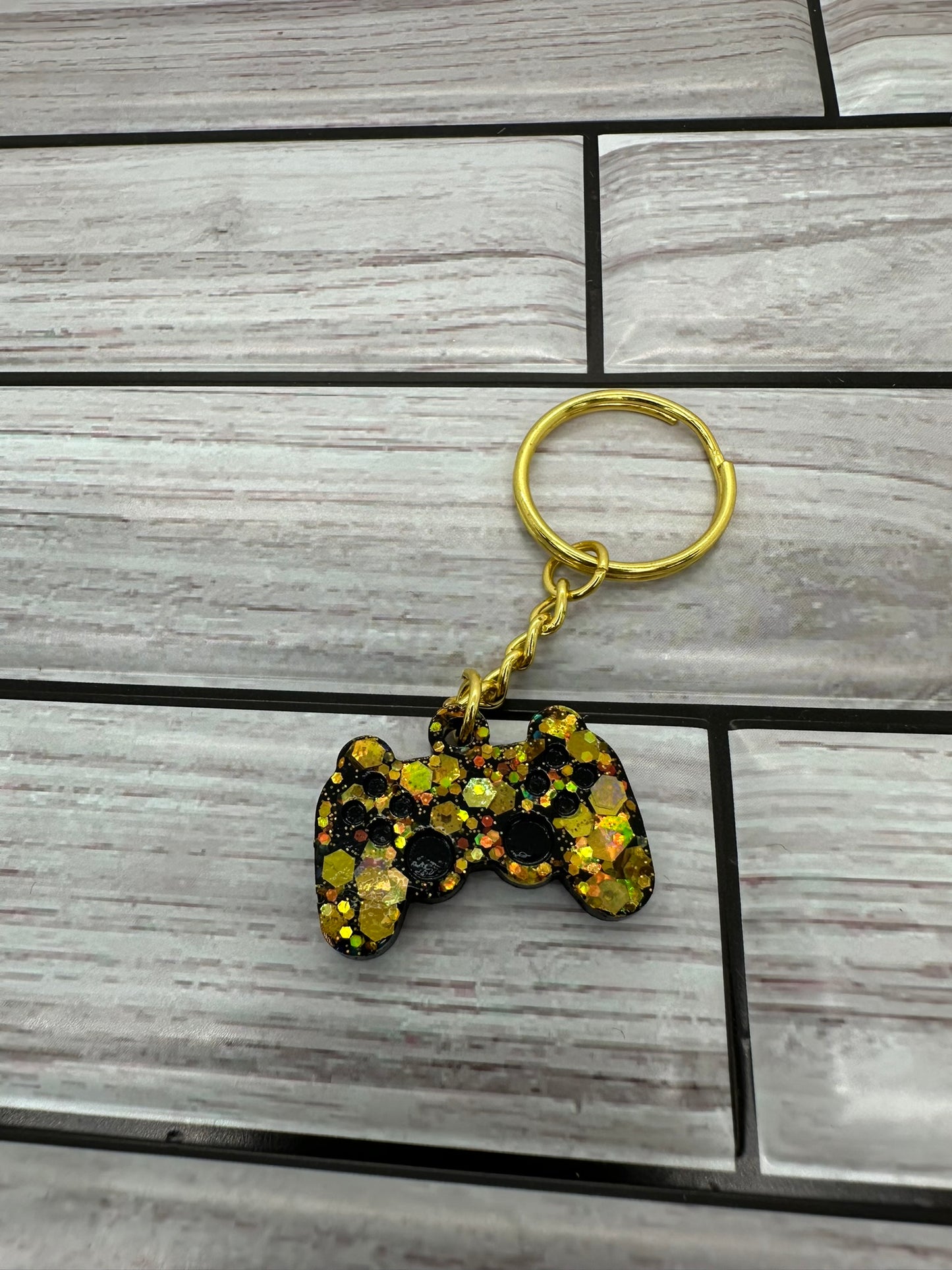 Gold and Black Game Controller Keychain