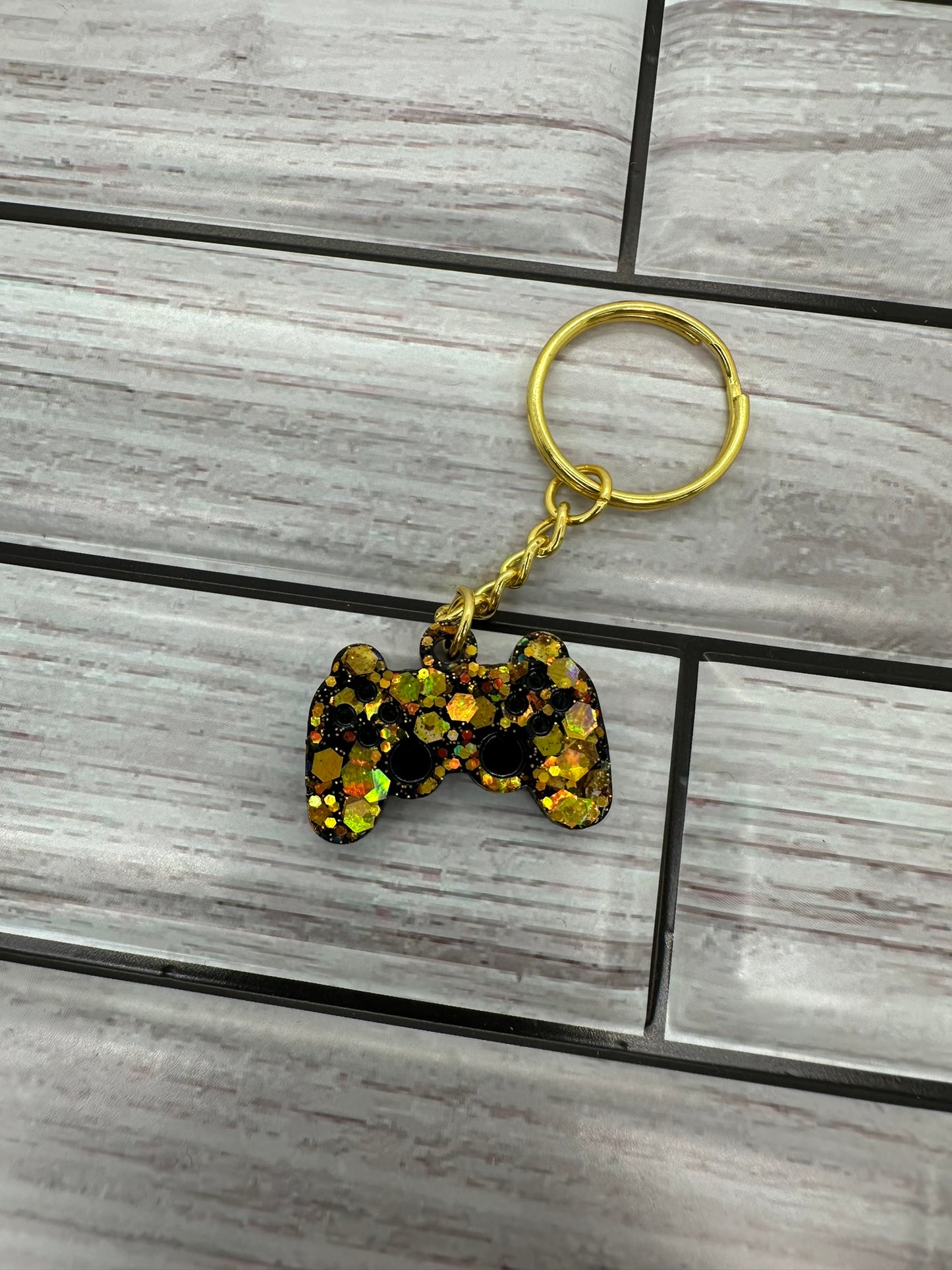 Gold and Black Game Controller Keychain