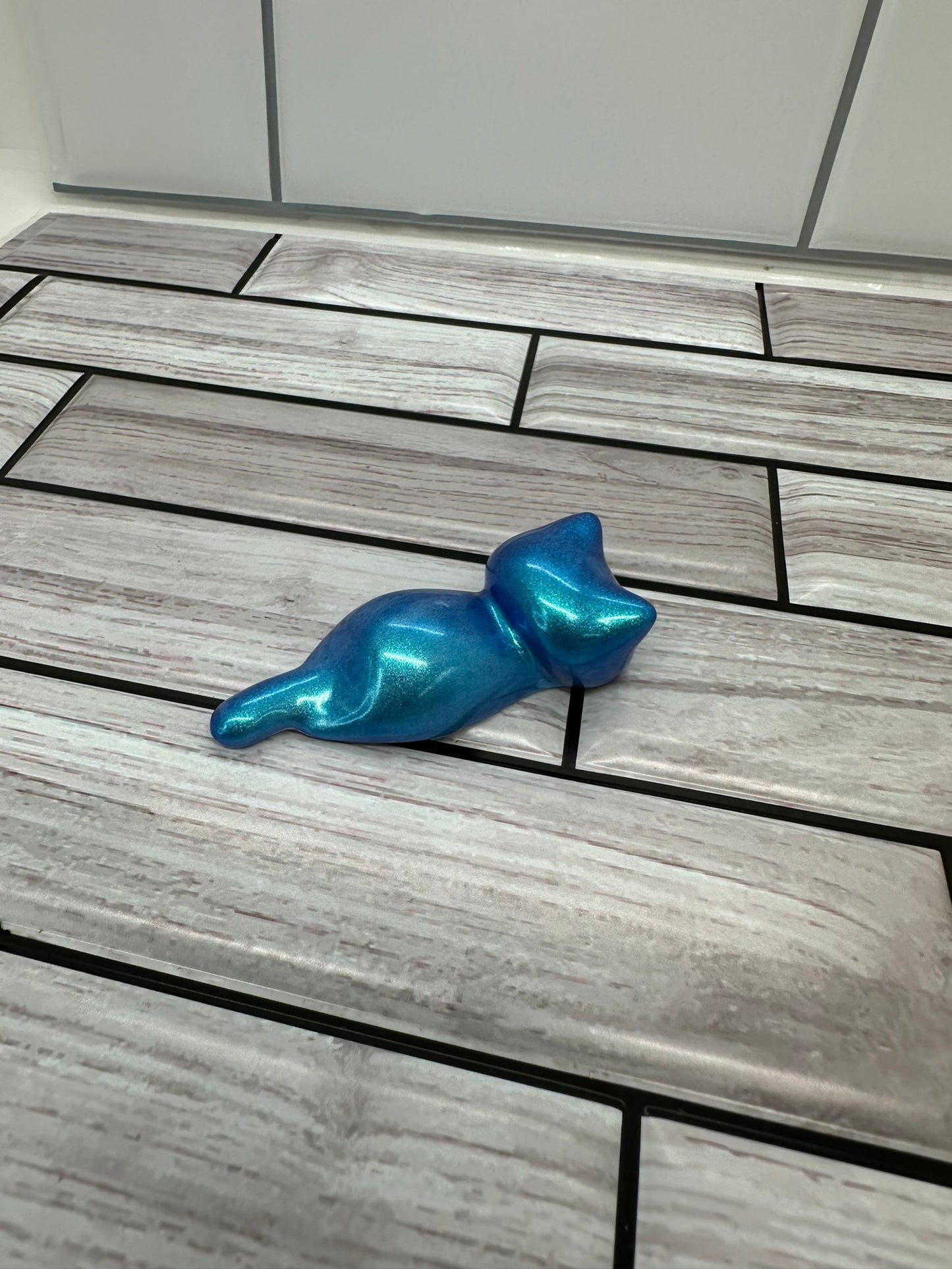 Blue Shimmer Cat Pen Rest