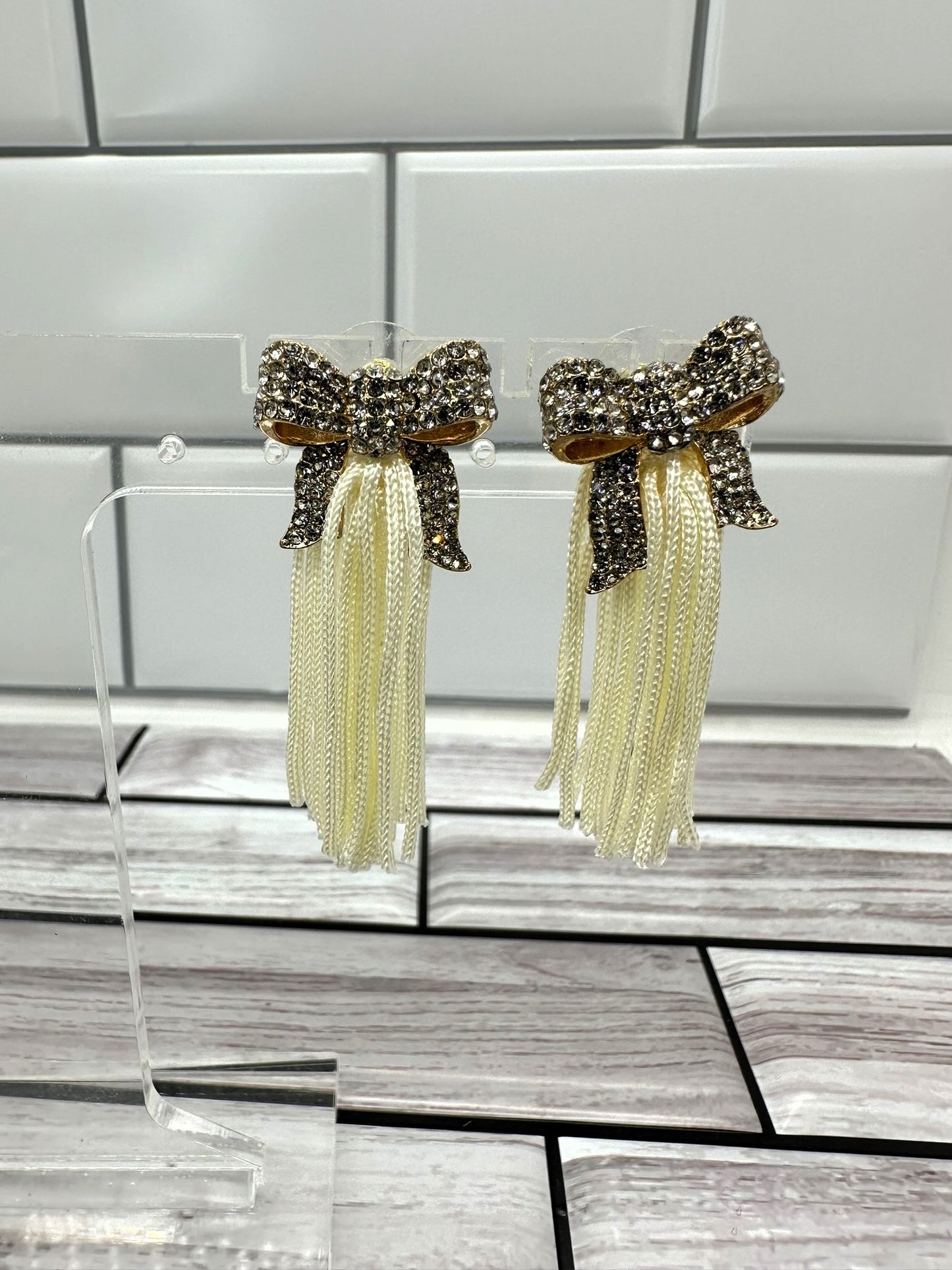 Gold Bow with Cream Tassel Earrings