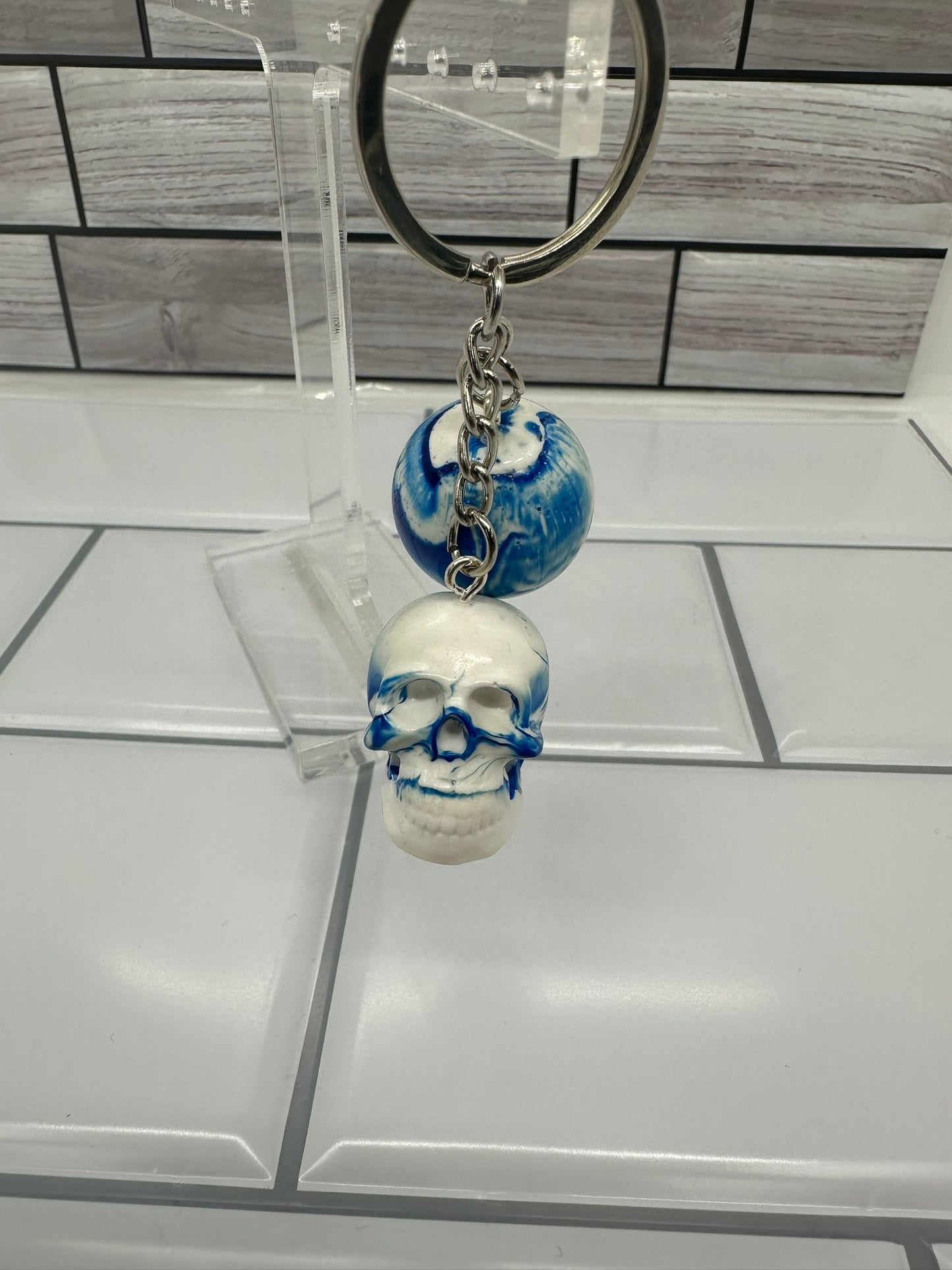 White & Blue Swirl Skull and Sphere Keychain