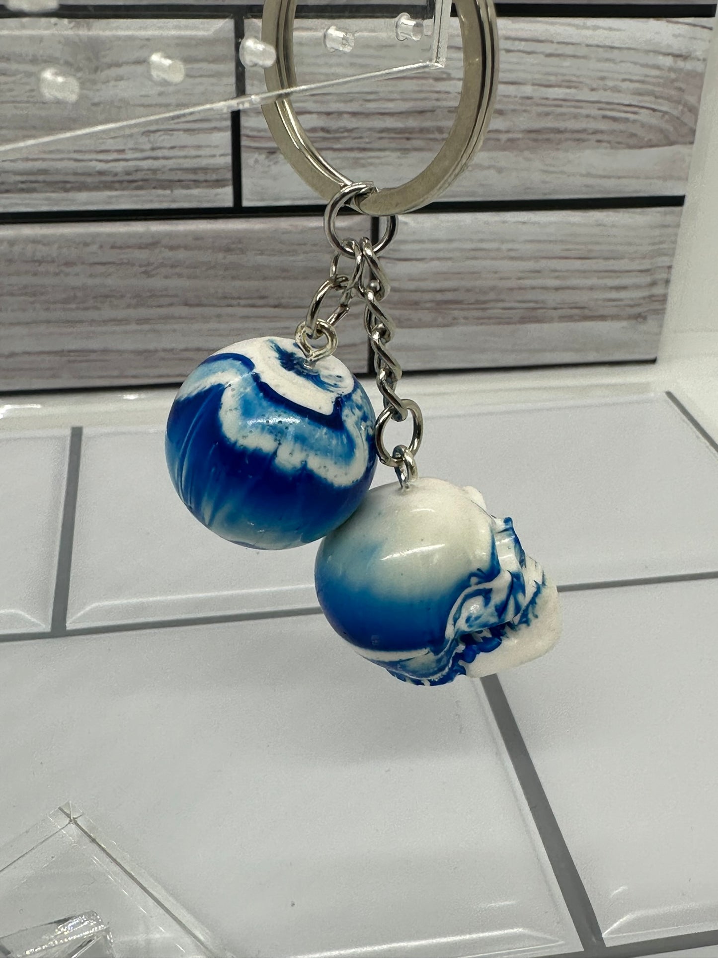 White & Blue Swirl Skull and Sphere Keychain