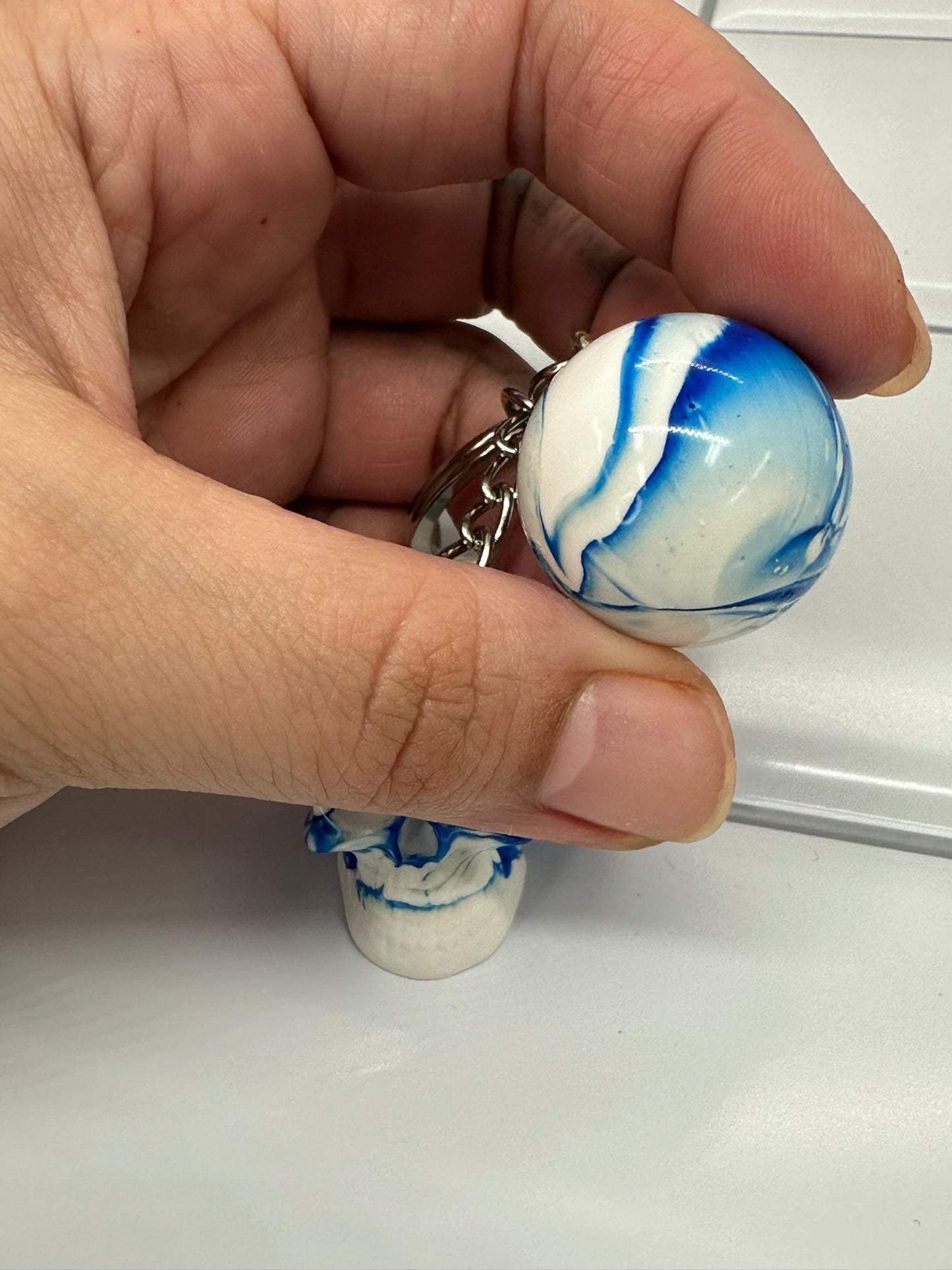 White & Blue Swirl Skull and Sphere Keychain