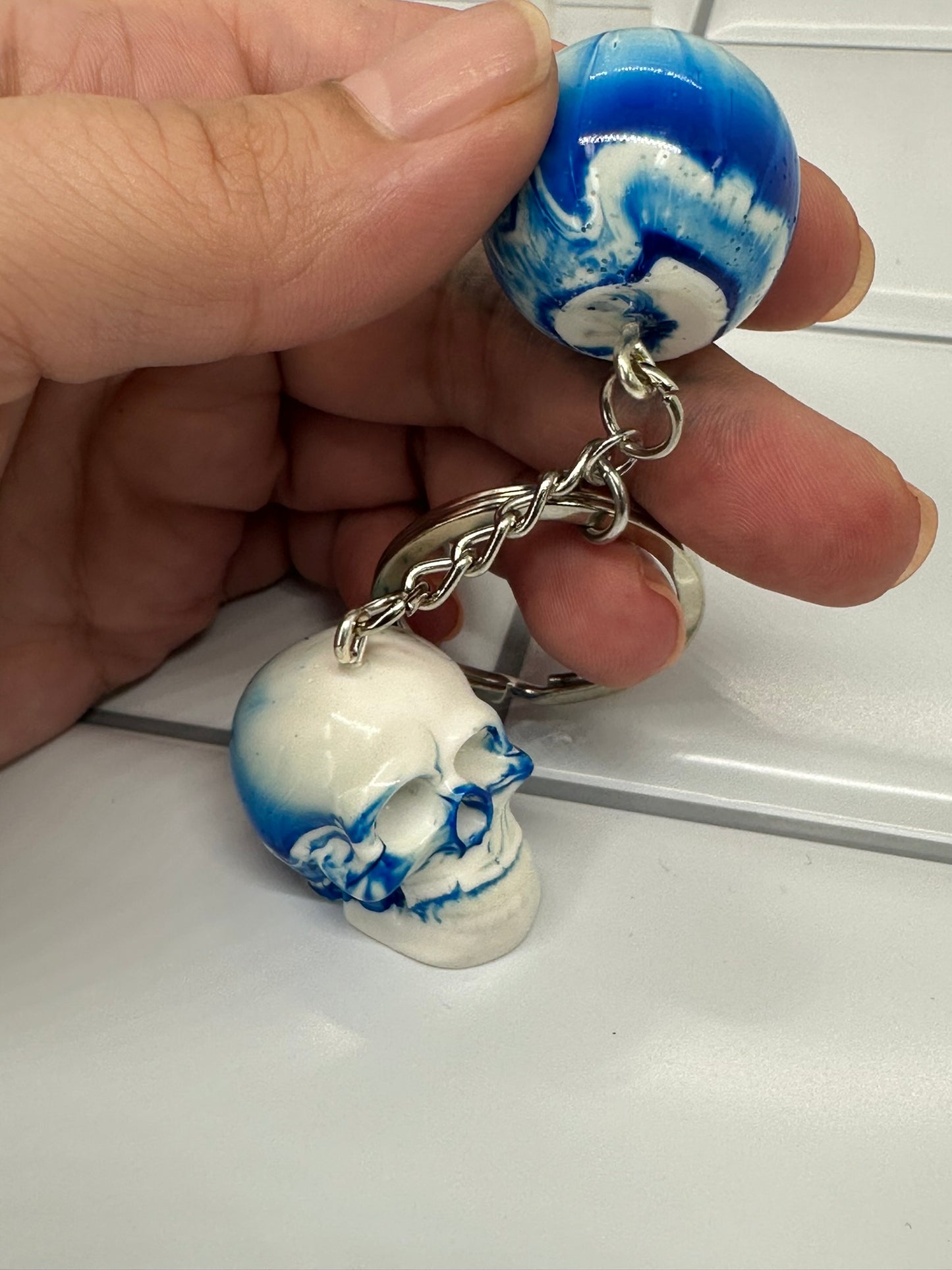 White & Blue Swirl Skull and Sphere Keychain