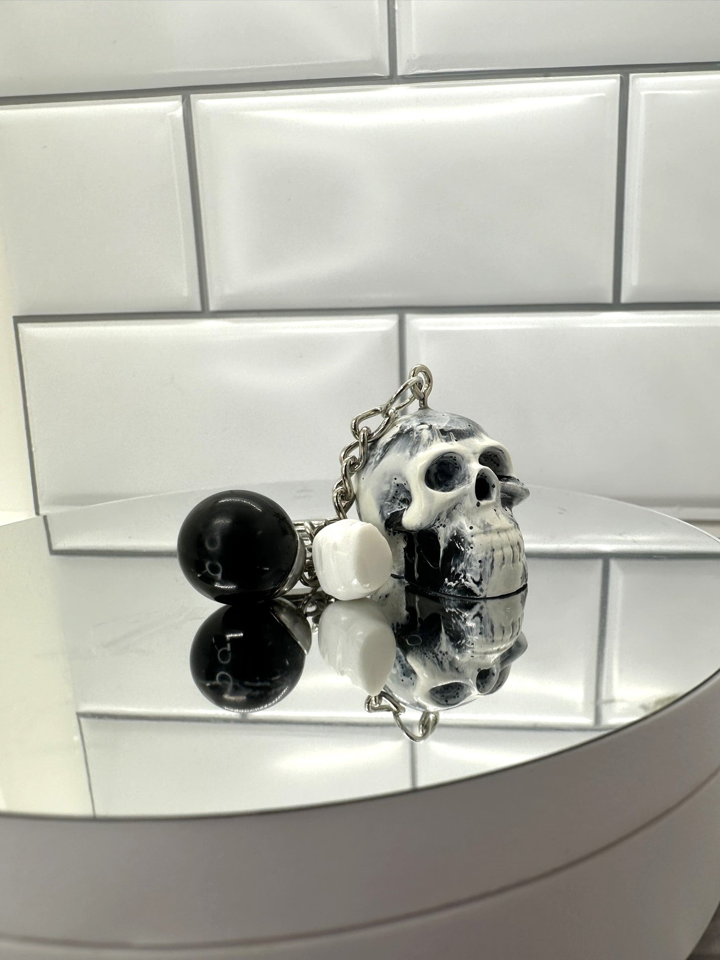 Black and White Swirl Skull Keychain with Black Sphere and White Mini Skull