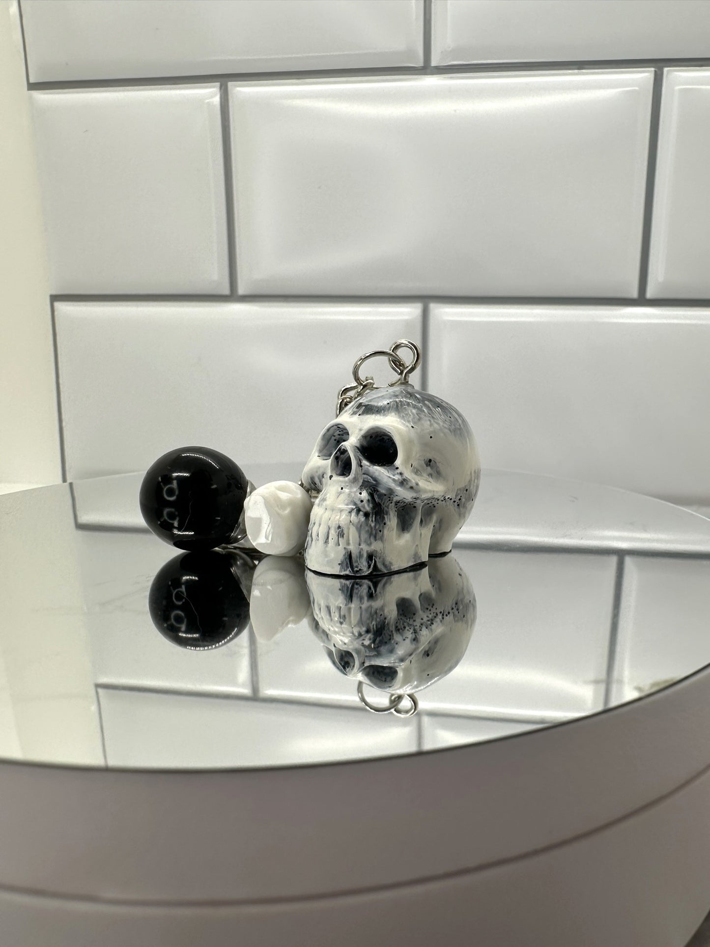 Black and White Swirl Skull Keychain with Black Sphere and White Mini Skull