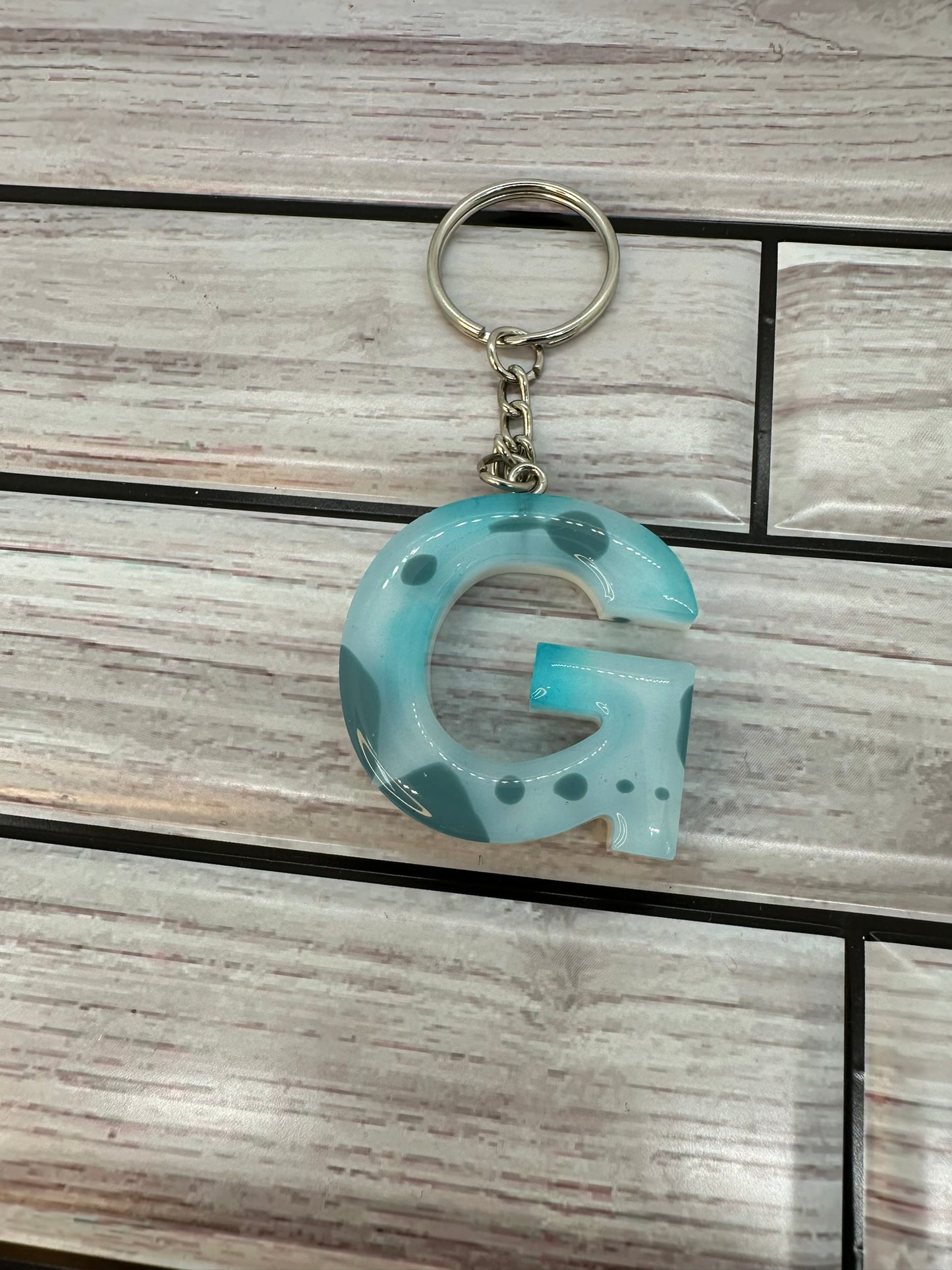 Blue and White Swirled Resin Letter G Keychain