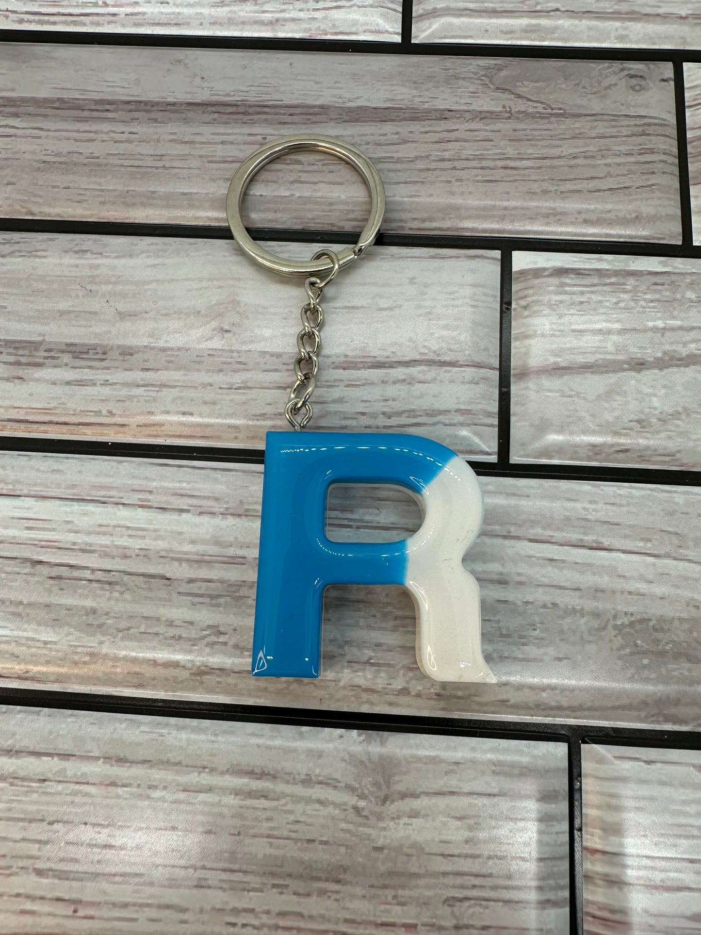 Blue and White Swirled Resin Letter R Keychain