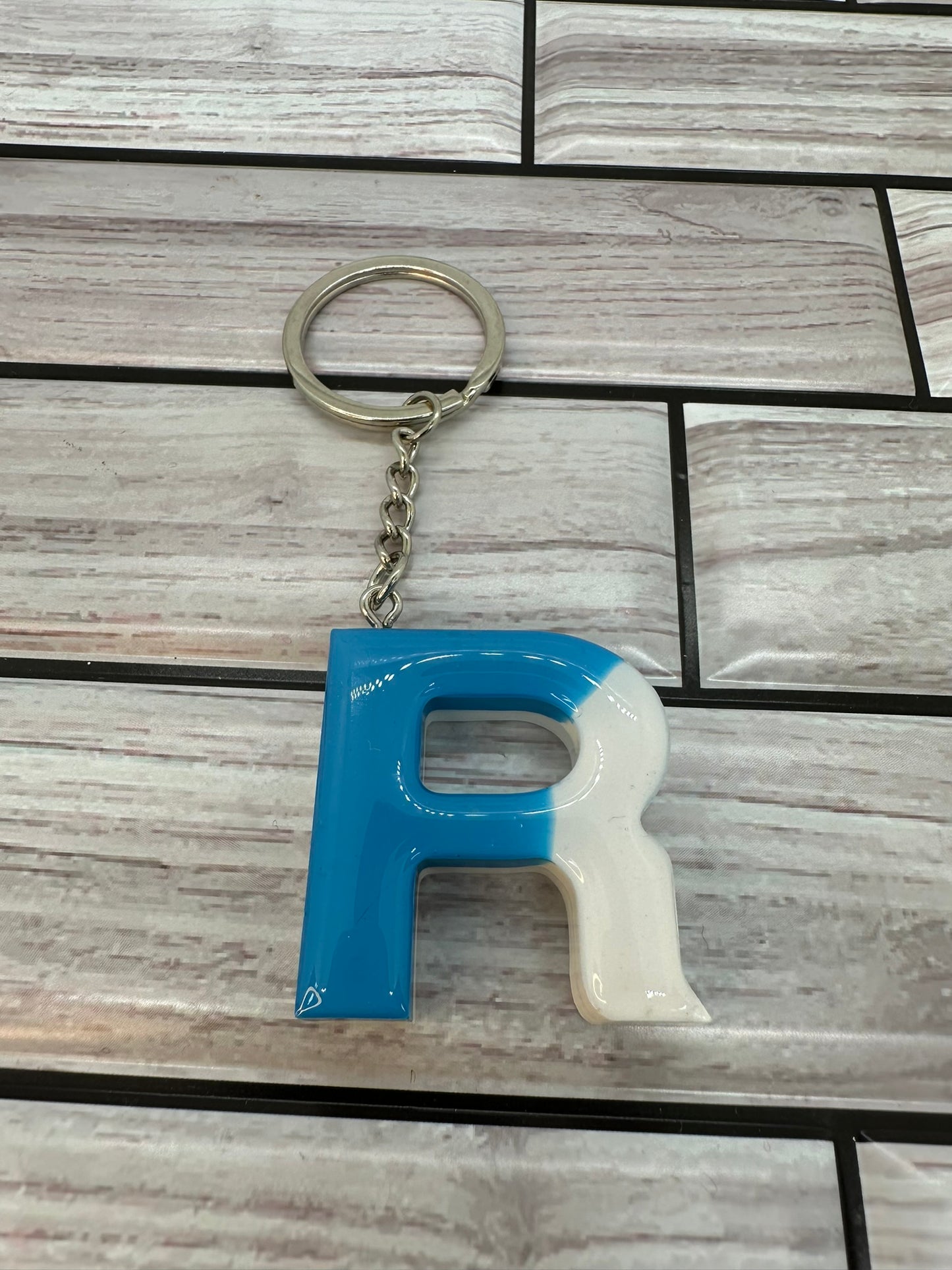 Blue and White Swirled Resin Letter R Keychain