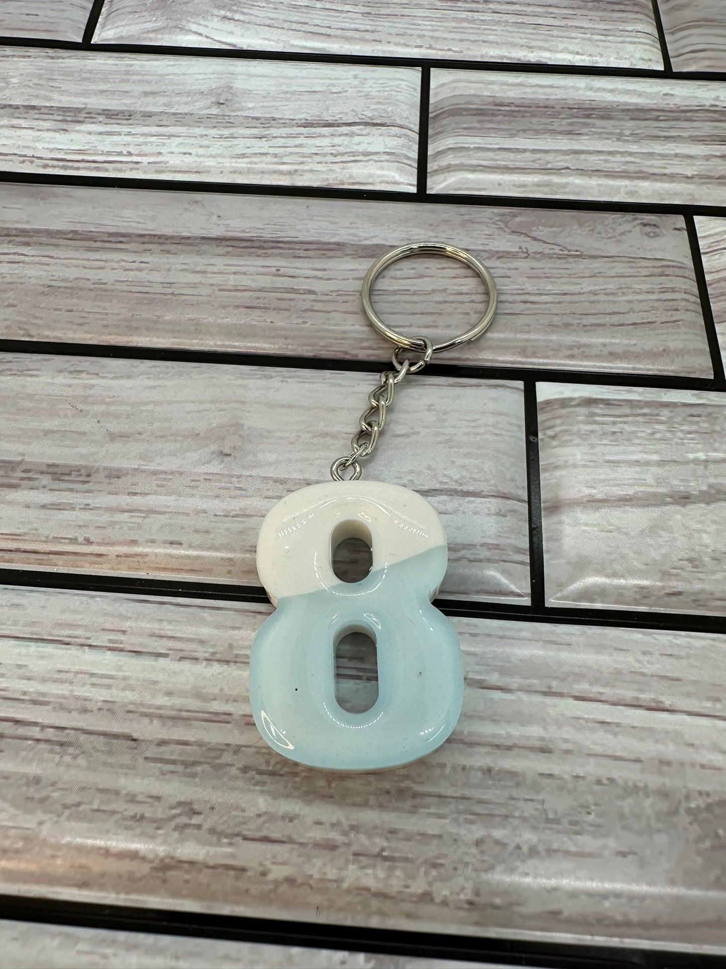 Blue and White Swirled Resin Number 8 Keychain