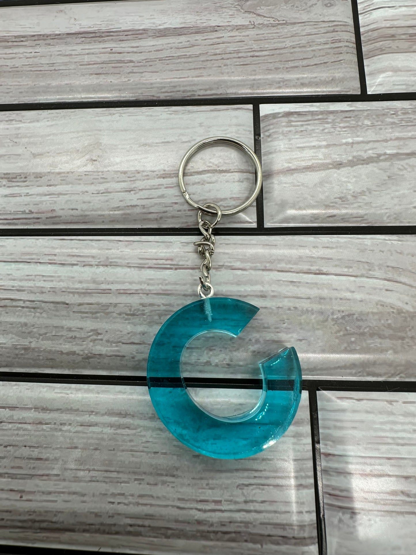 Transparent Teal Resin C Keychain