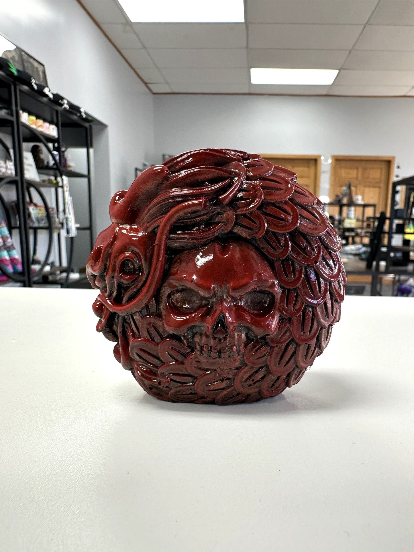 Crimson Skull with Dragon Feathers