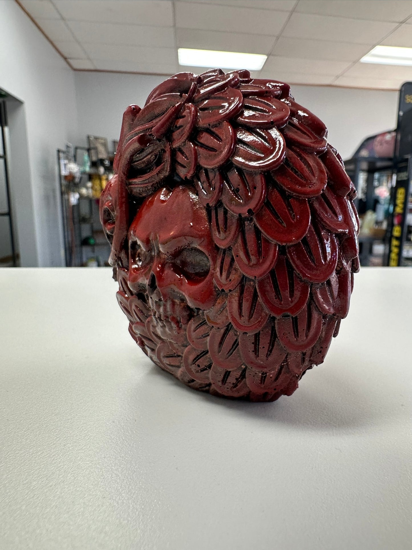 Crimson Skull with Dragon Feathers