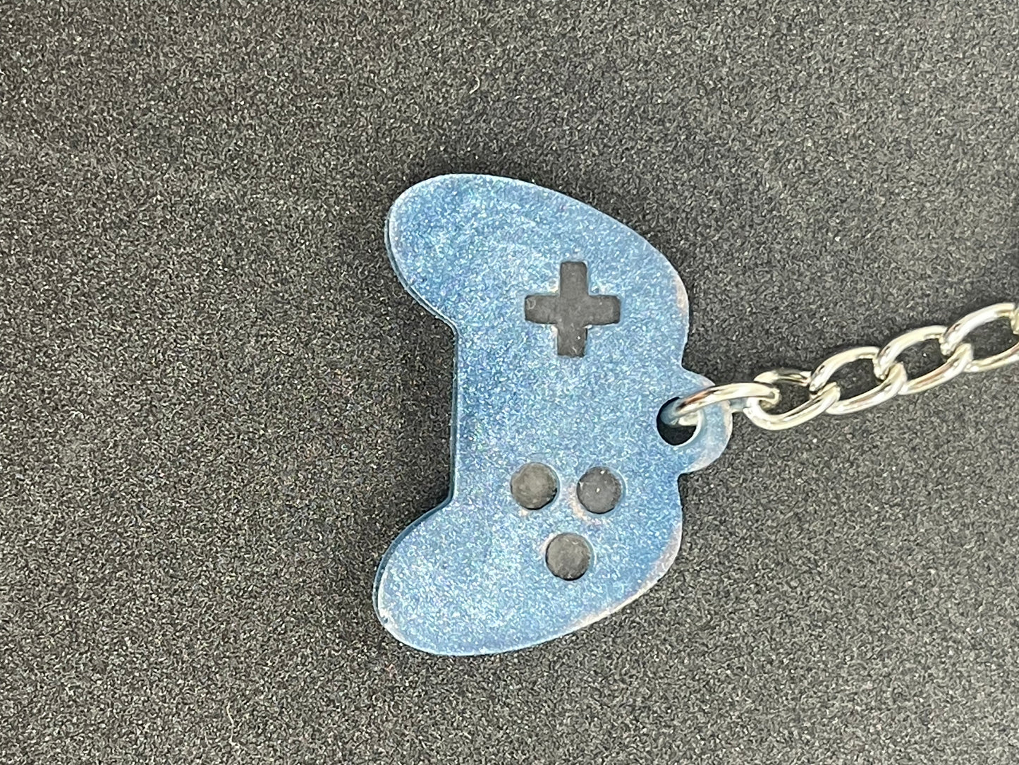 Lighter Blue and Black Game Controller Keychain